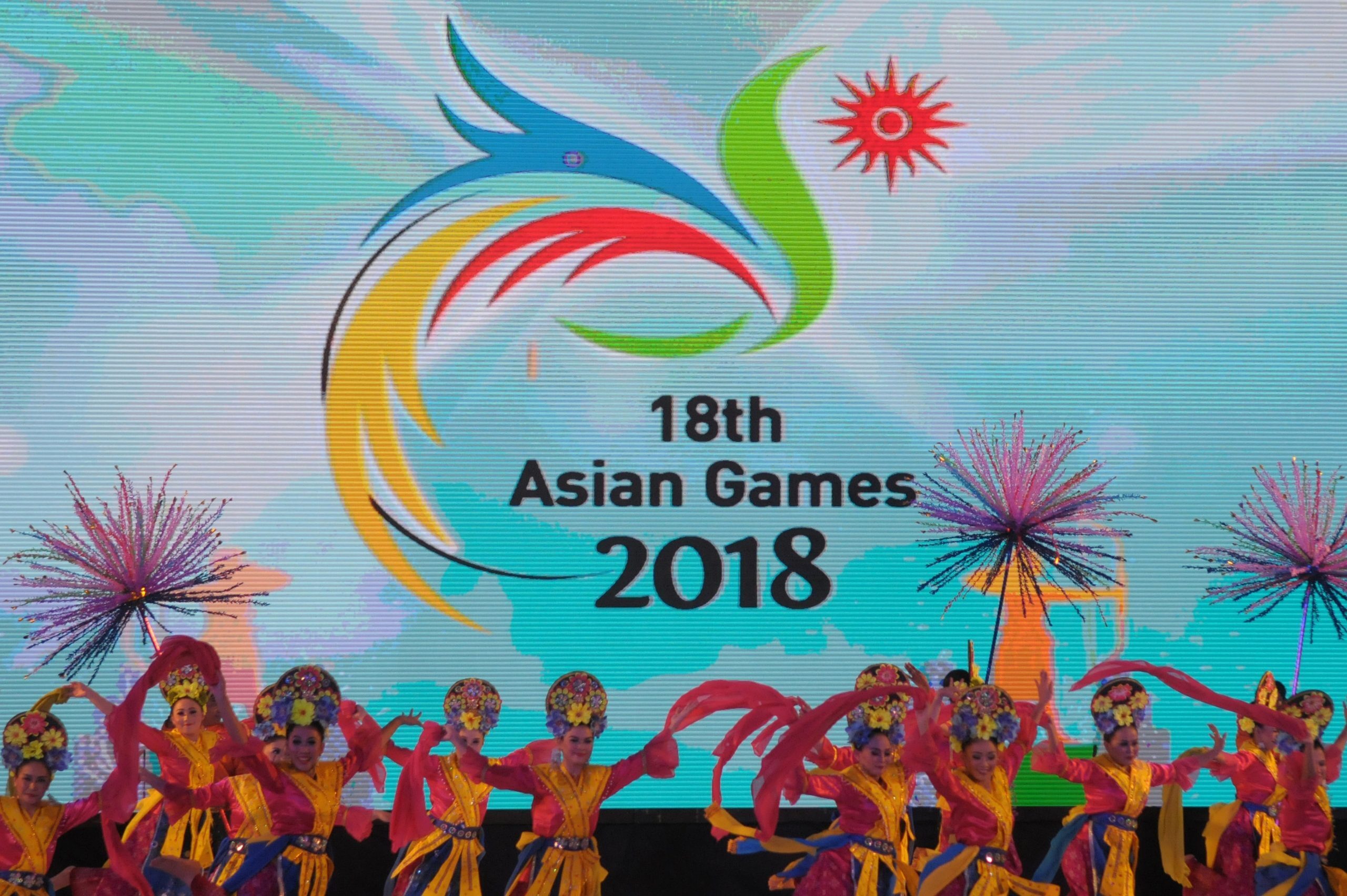 Indonesian dancers perform at the 2018 Asian Games (Photo credit should read STR/AFP/Getty Images)