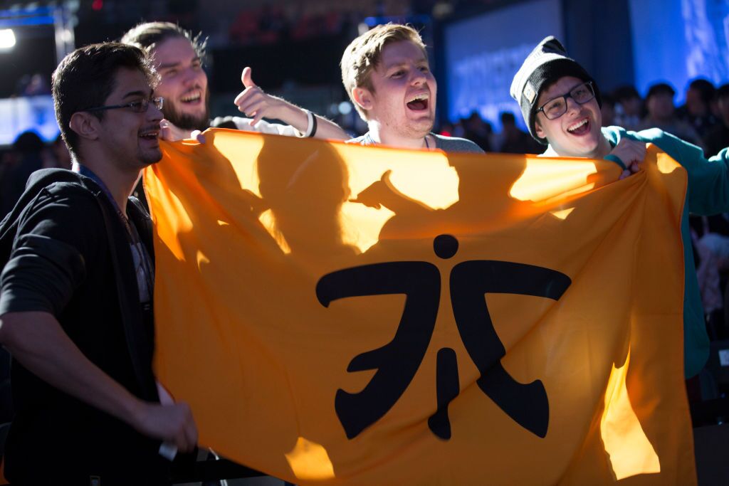 Fans showing off their Fnatic flag at semifinals of the League Of Legends Worlds Championship (Photo courtesy of Getty Images)